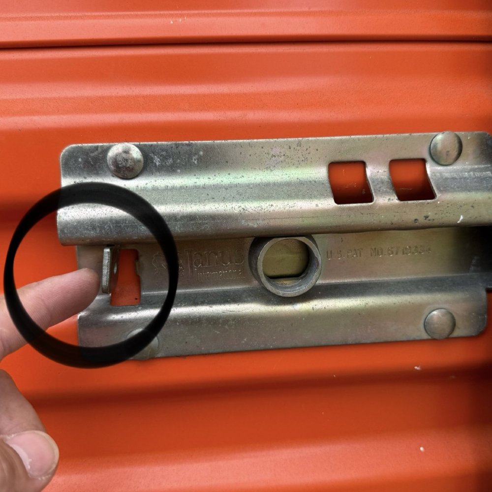 Push the handle toward the wall until the latch aligns.